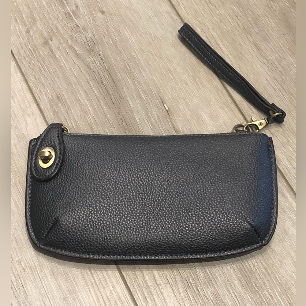 Dark grey wristlet/cross body purse.